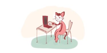 デスクワークをする猫のイラスト